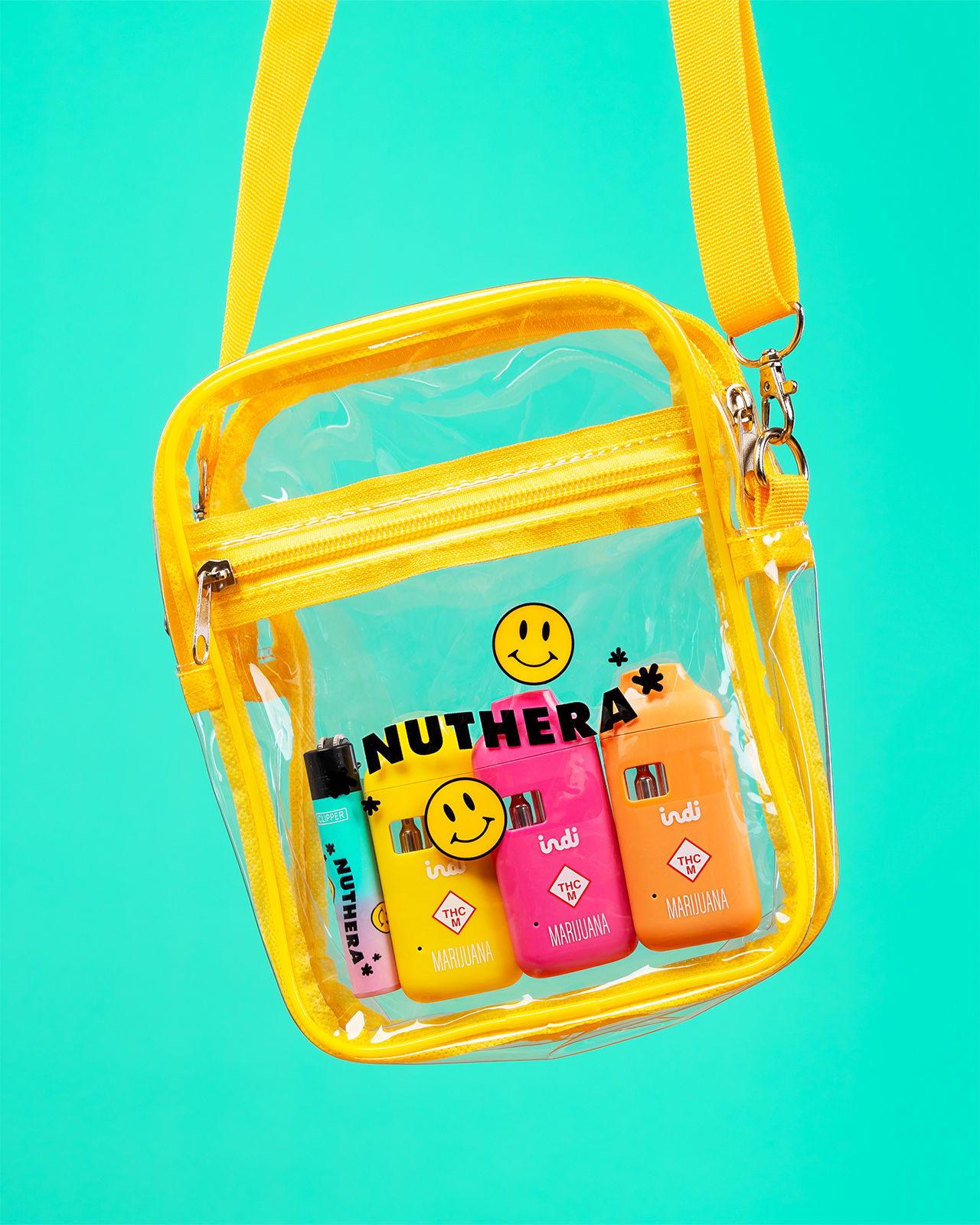 A clear bag with the word Nuthera on the front holds three Indi Vapes and a lighter.